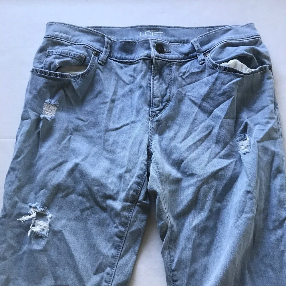 LOFT Light Wash Relaxed Skinny Distressed Jeans Size 0/25 Holes A1195